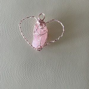 Rose quartz wrapped in heart shaped wire